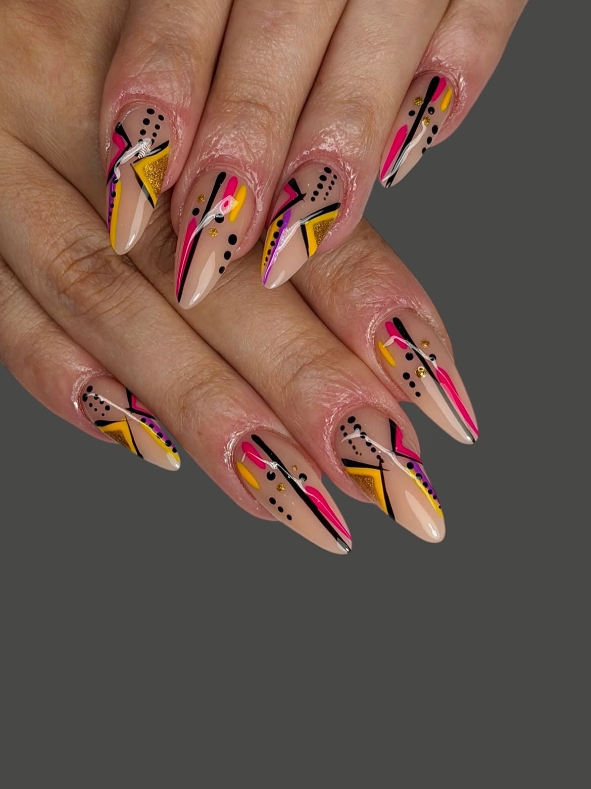 Abstract Geometric Stiletto Nails with Neon Accents
