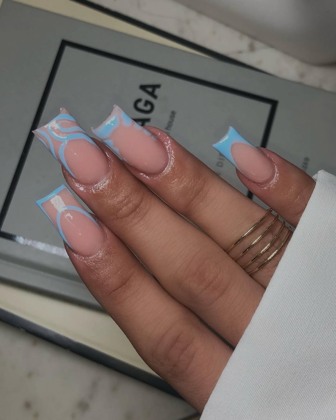 Baby Blue Swirl French Tip Almond Nails