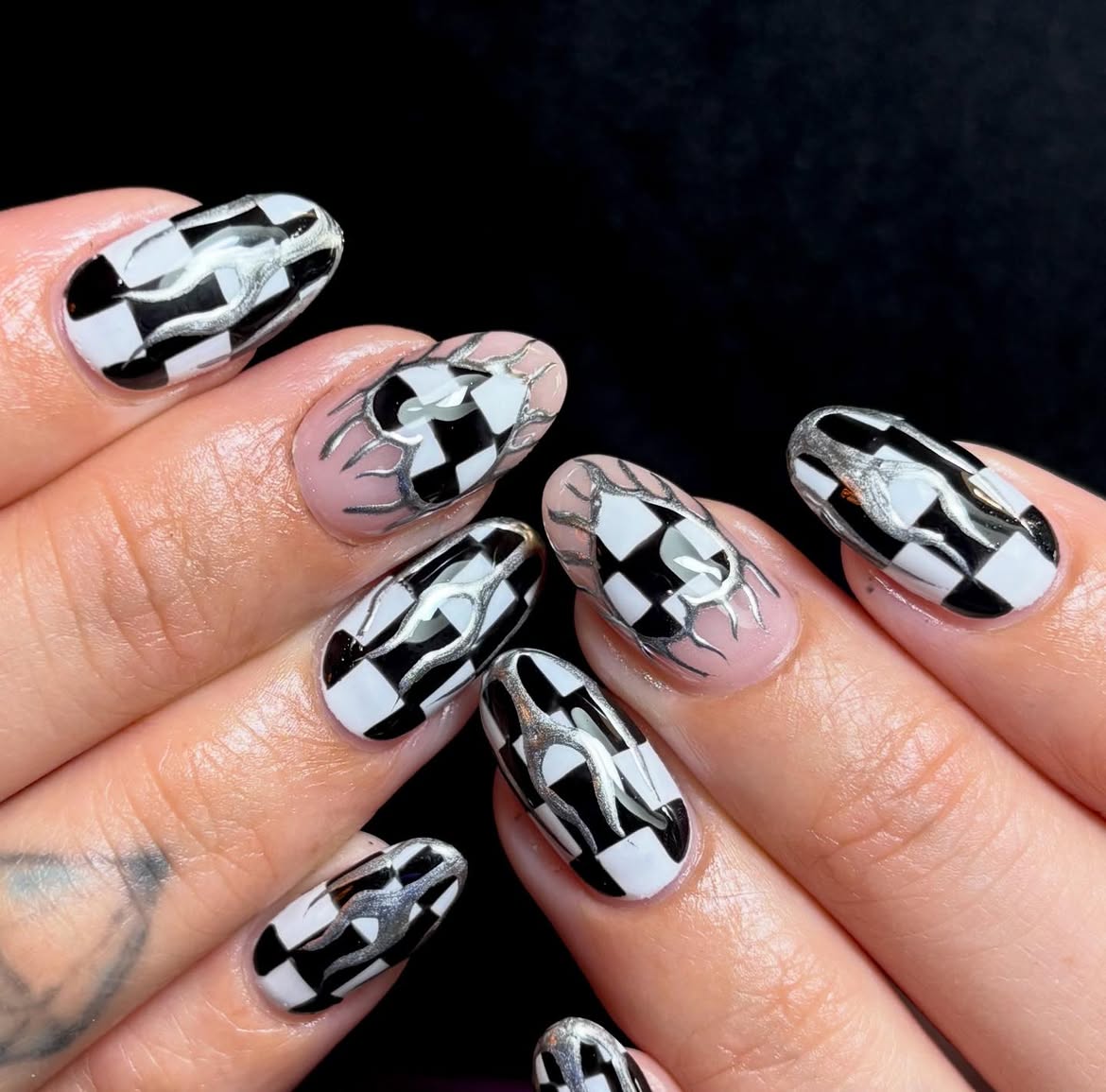 Black and White Checkerboard Flame Accent Nails