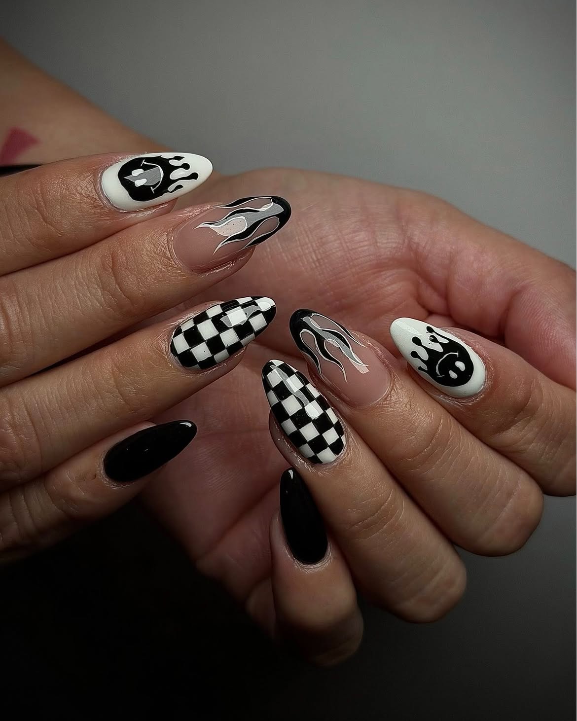 Black and White Checkerboard Flame Smiley Nails