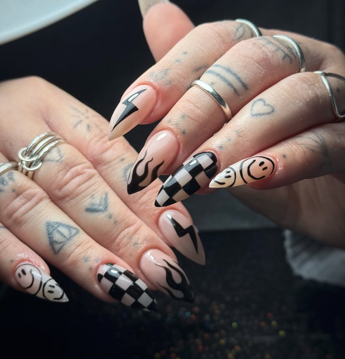 Black and White Checkerboard Flame Smiley Stiletto Nails