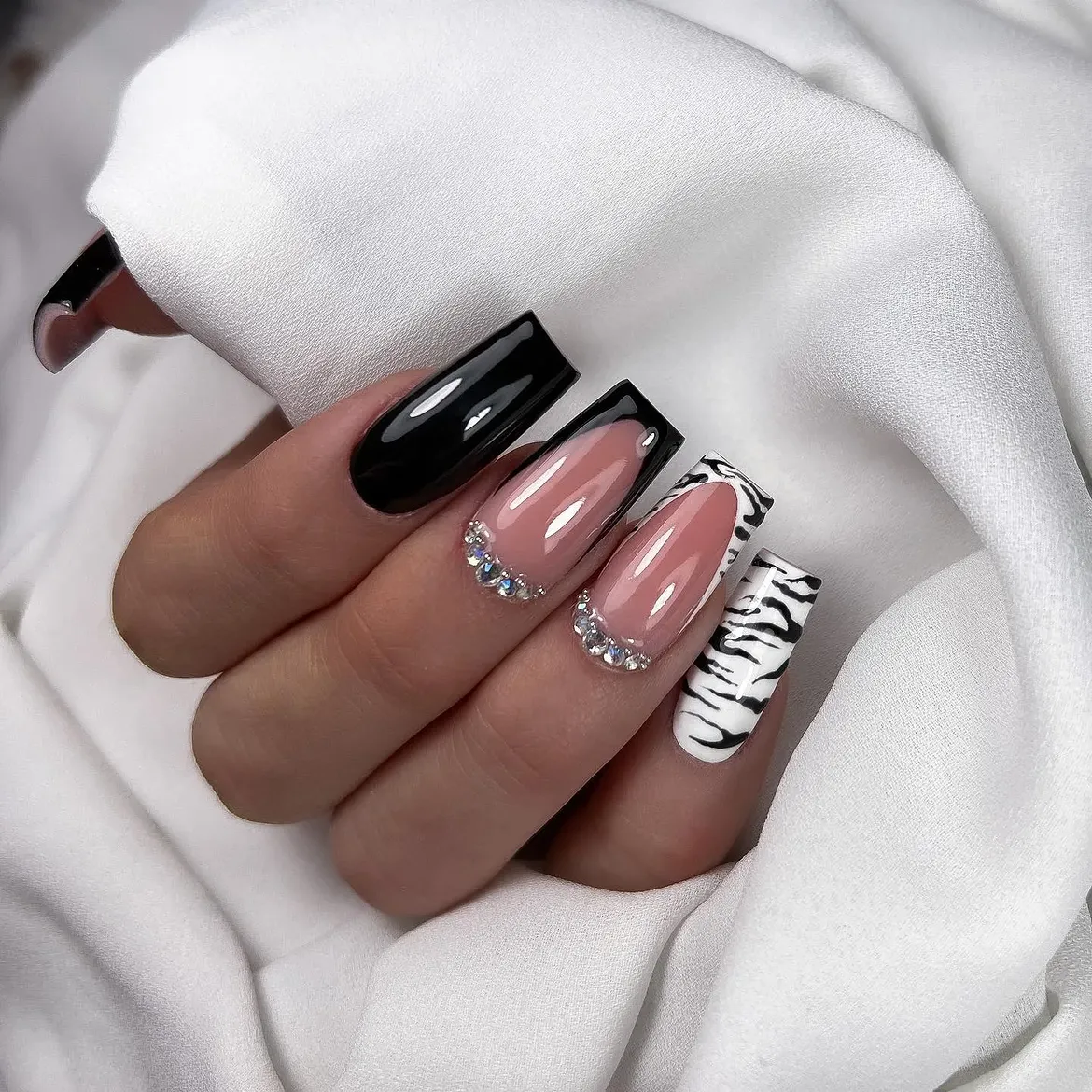 Black French Tip Glam with Tiger Accent Nails