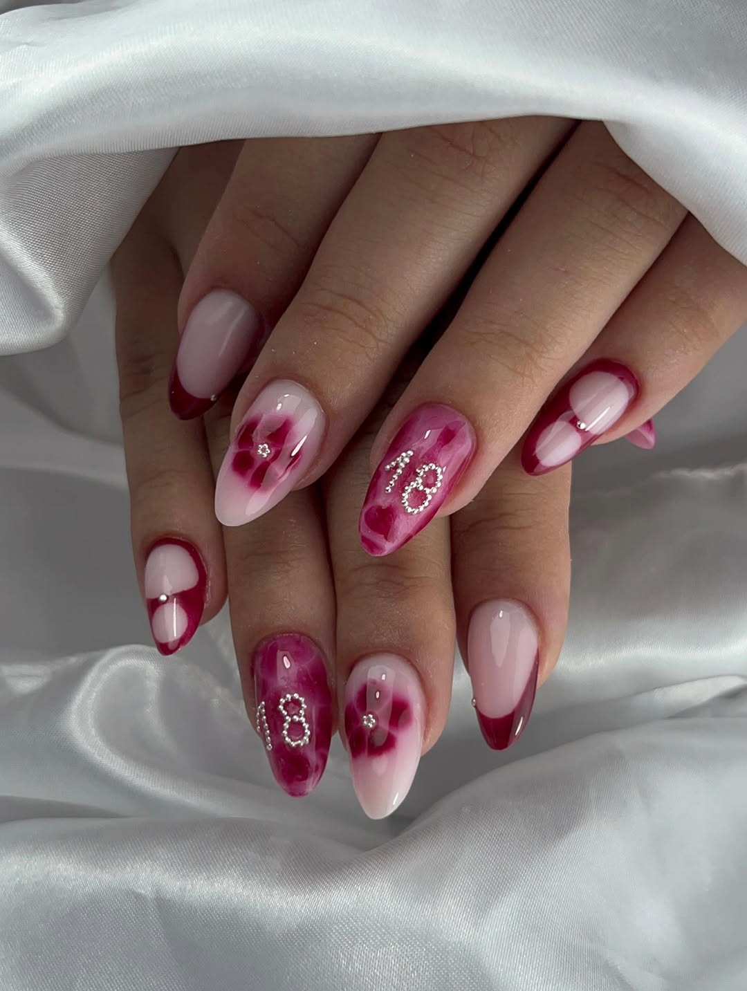 Bold Abstract Magenta Almond Anniversary Nails with Rhinestones