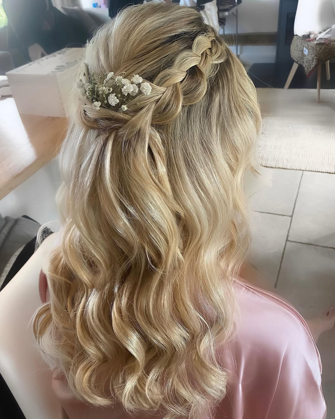 Braided Crown With Loose Waves and Baby's Breath