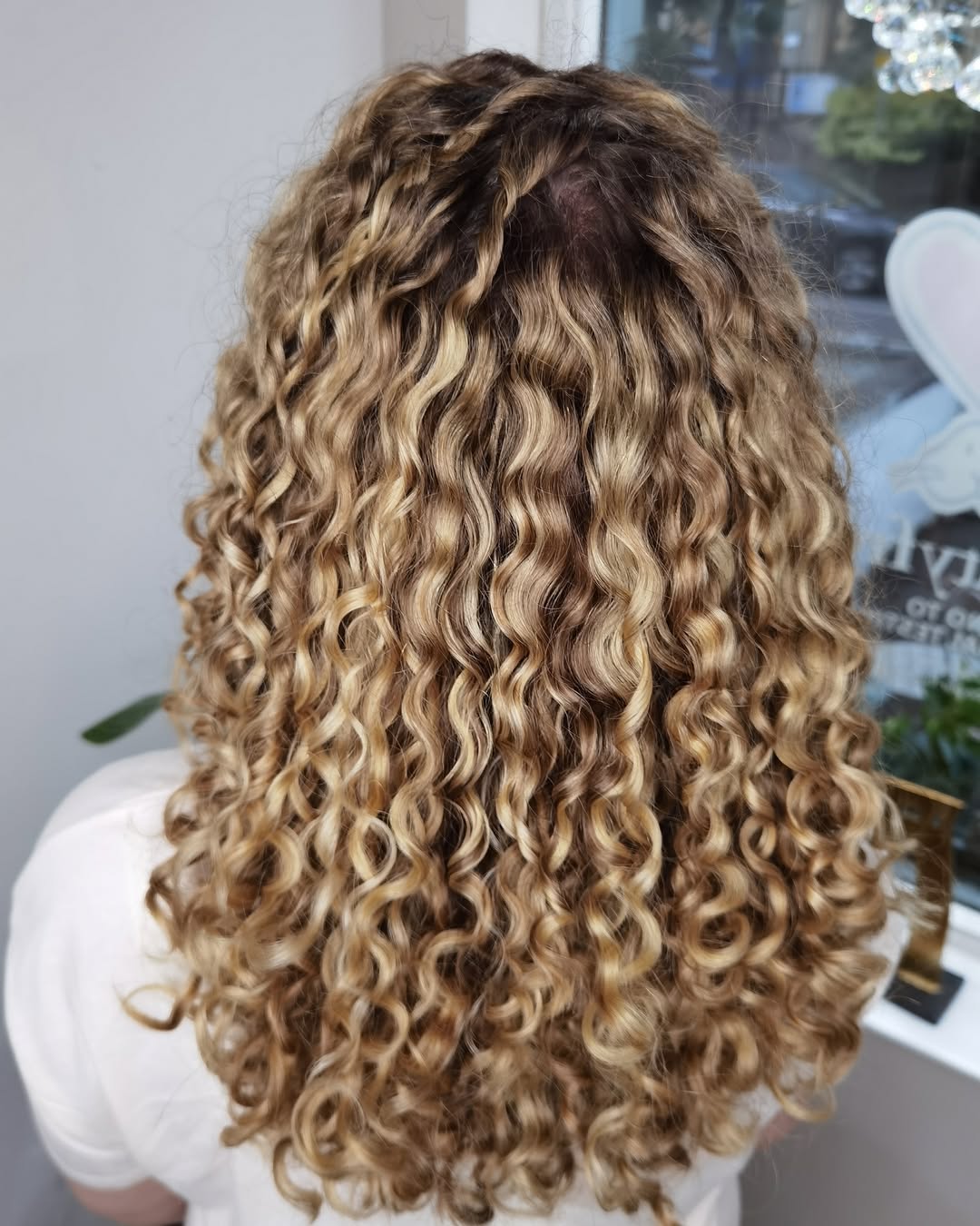 Cascading Curls With Honey Blonde Balayage