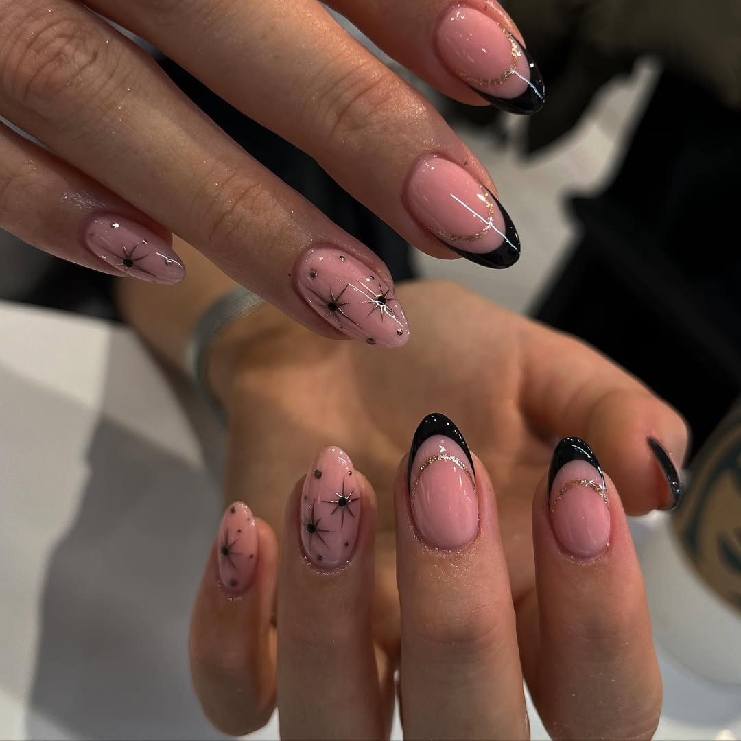 Chic Black French Tips with Starburst Accents