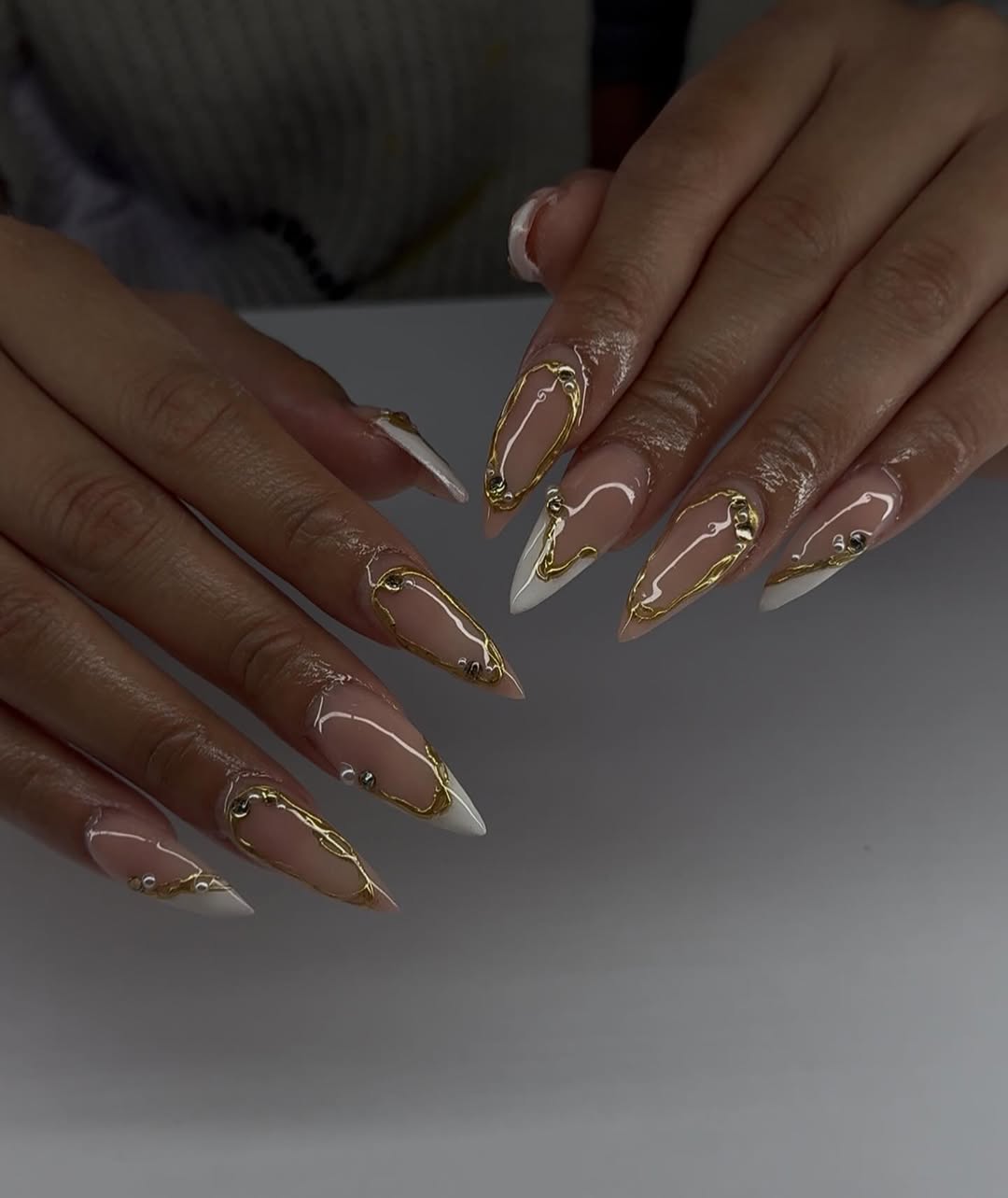 Chic Gold Swirl Almond French Tips