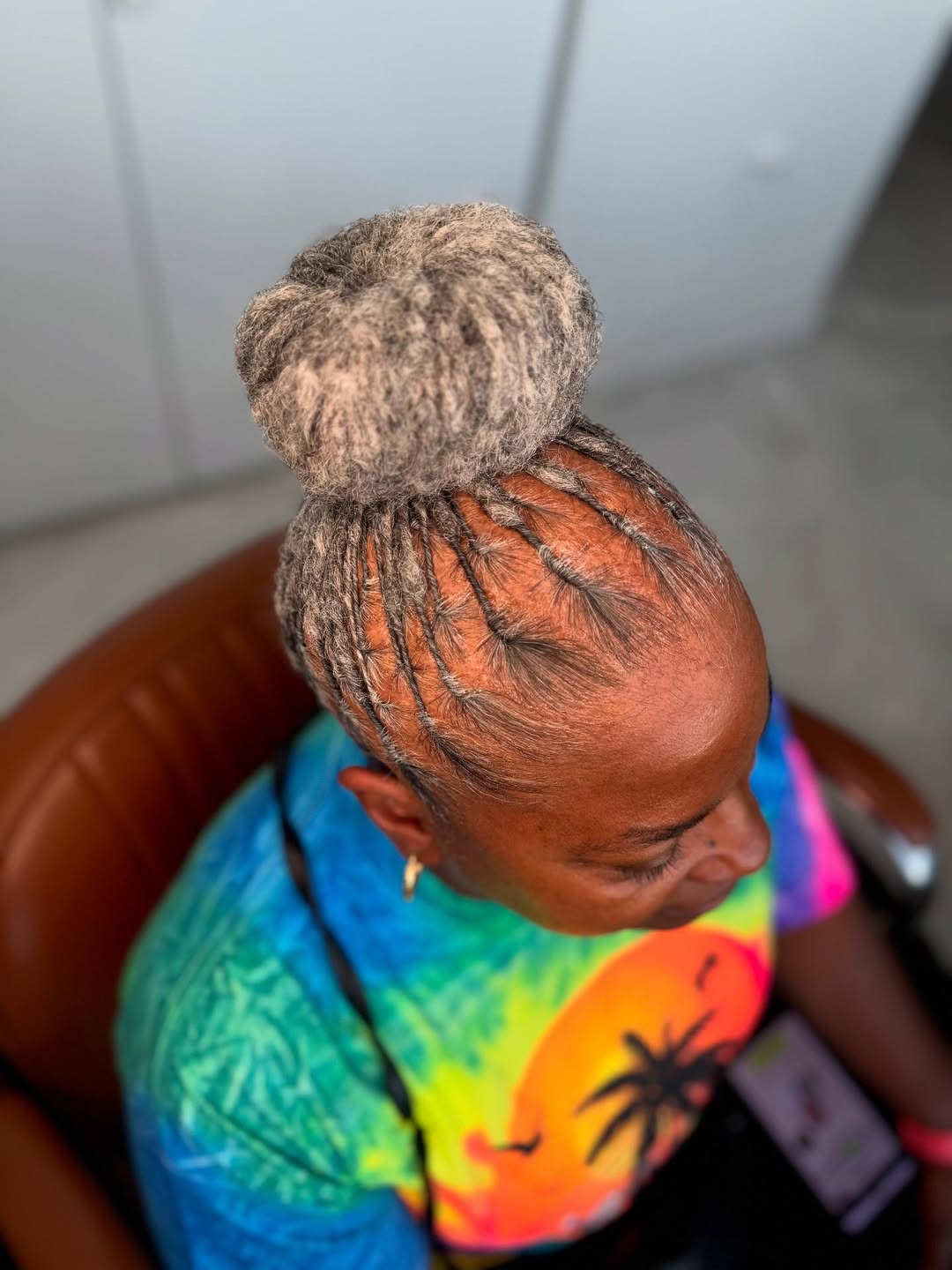 Chic High Bun With Intricate Root Braids