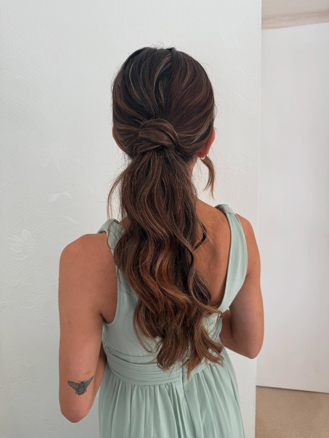 Chic Knotted Ponytail With Loose Waves