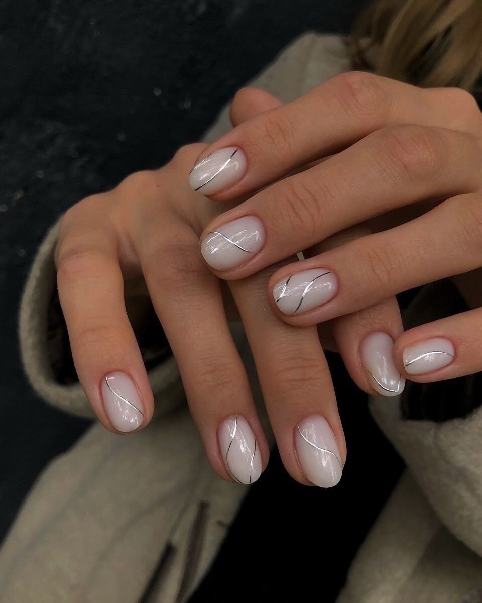 Chic Milky White Oval Nails With Silver Lines