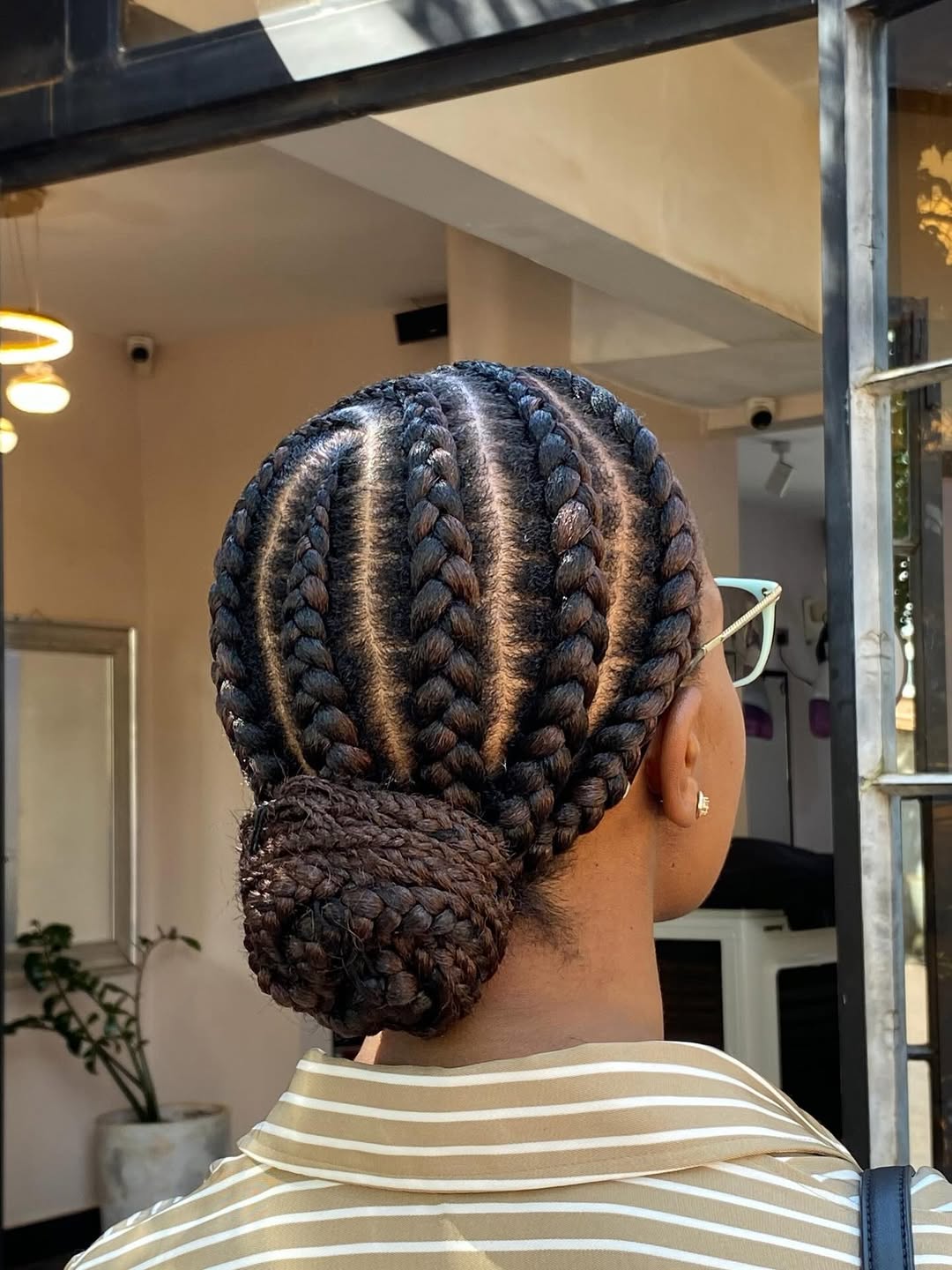 Classic Cornrow Updo With Low Bun