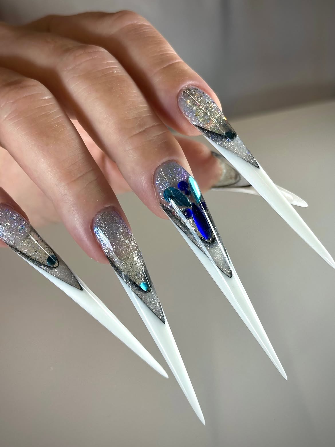 Crystal Embellished Stiletto Nails with Glitter Accents