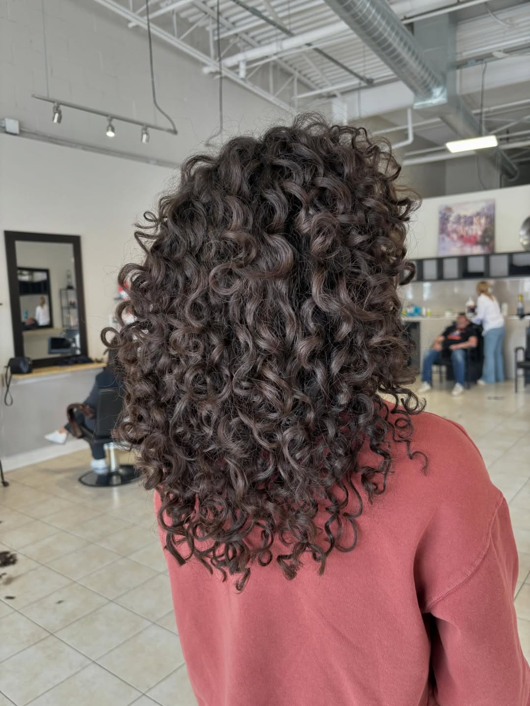 Defined Brunette Curls With Face Framing Layers