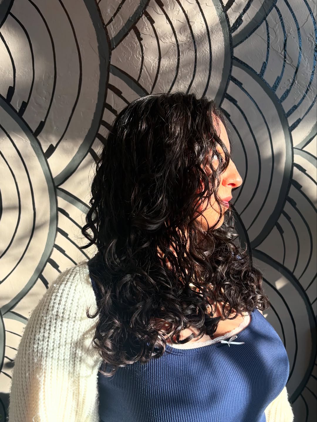 Defined Dark Brunette Curls With Face Framing Layers