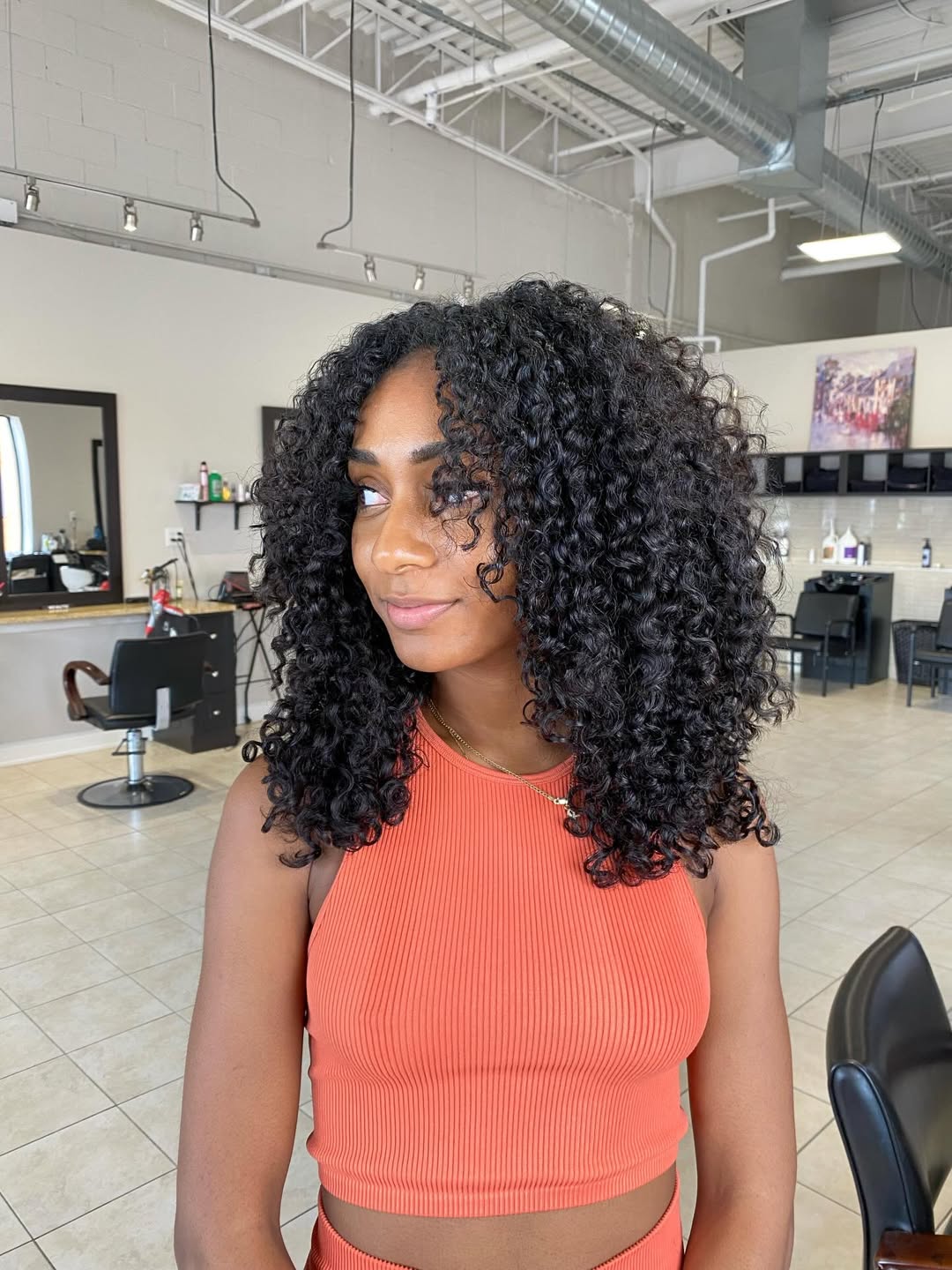 Defined Spiral Curls With Face-Framing Layers