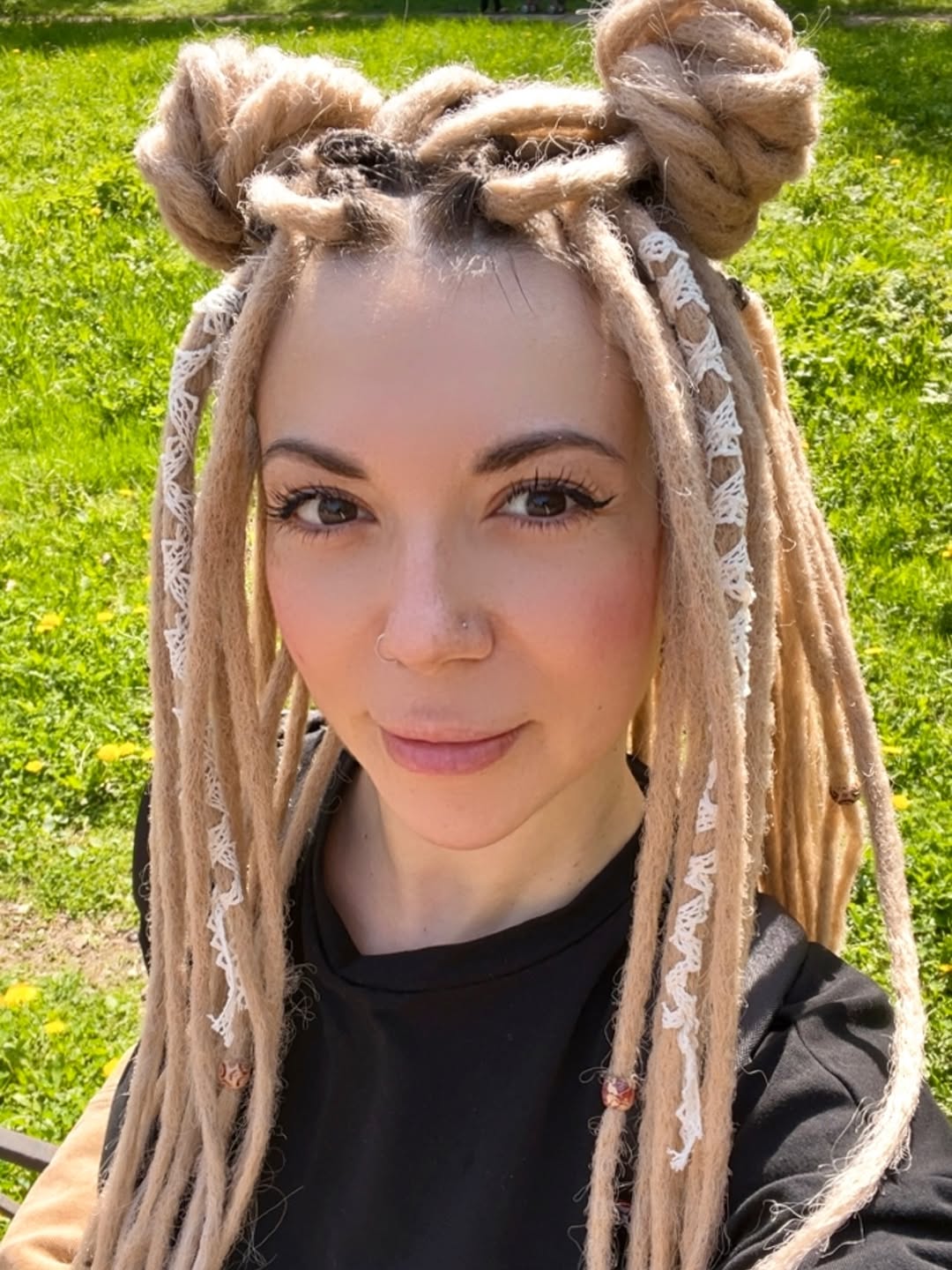 Double Bun Locs With Blonde Highlights
