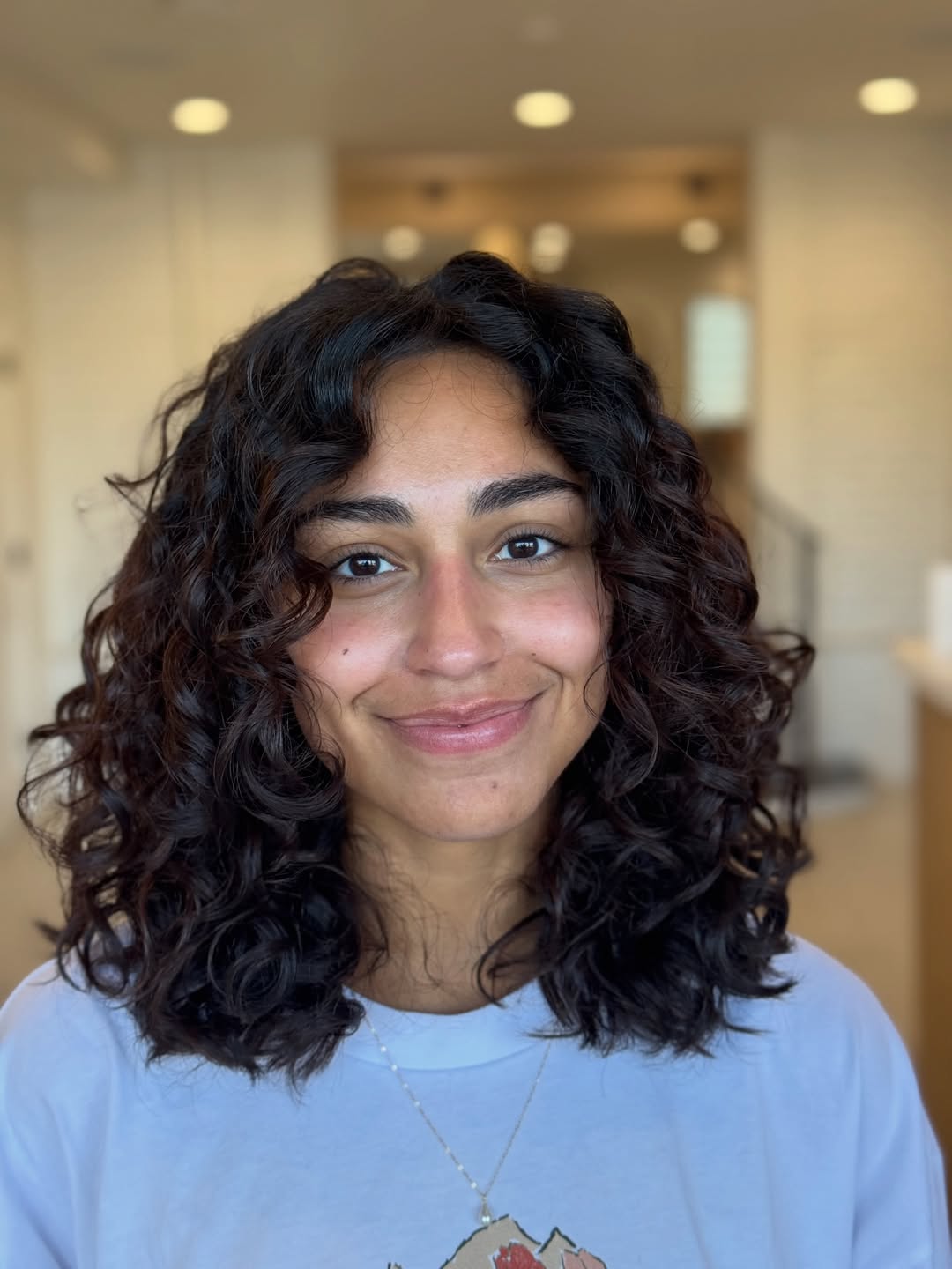 Effortless Medium Curly Locks With Face Framing