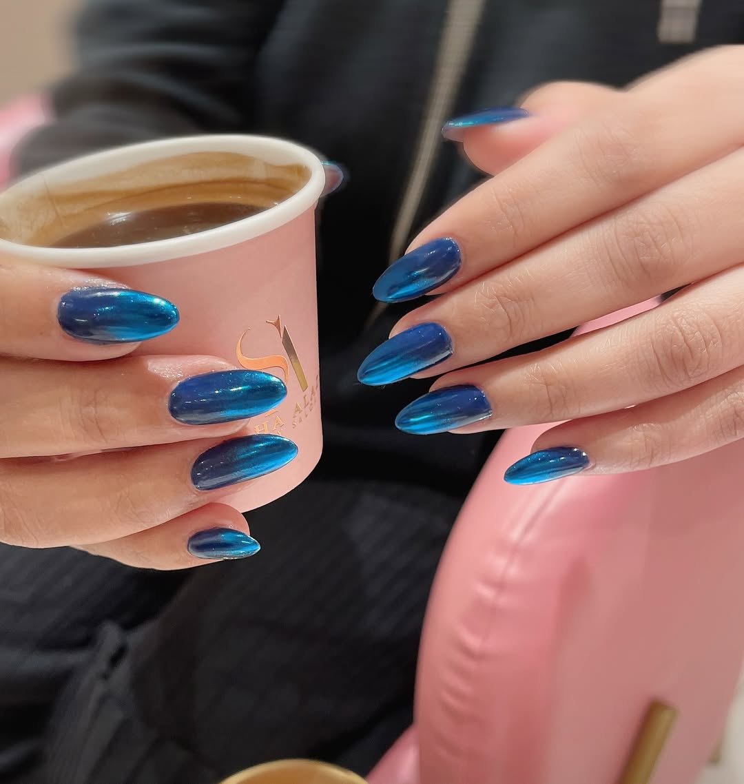 Electric Blue Chrome Almond Nails