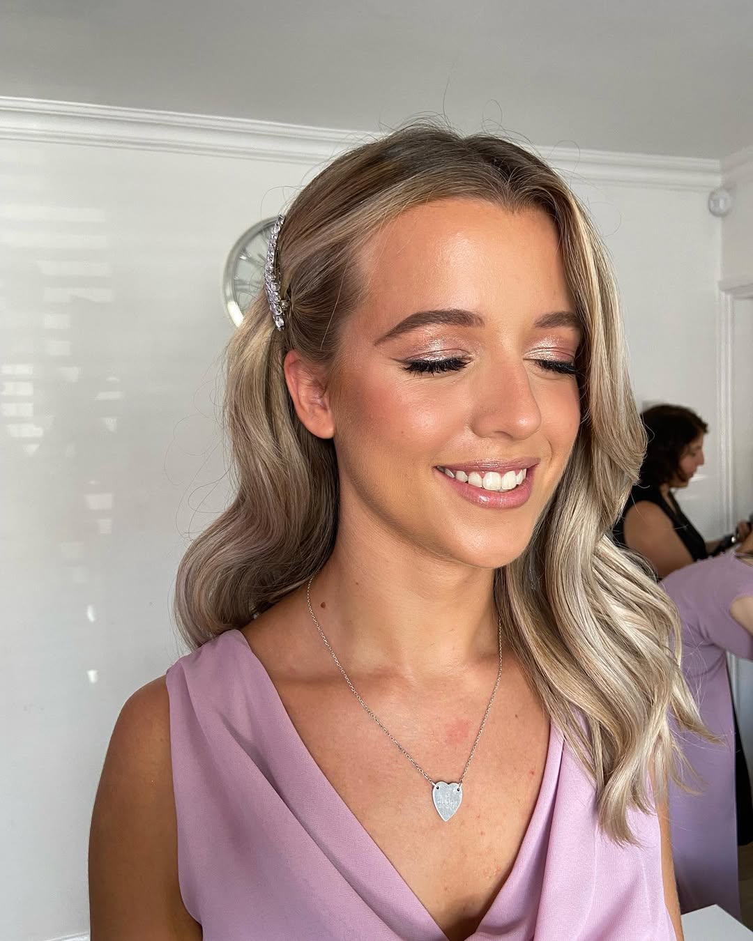 Elegant Wavy Half-Up Secured With Sparkle Clip