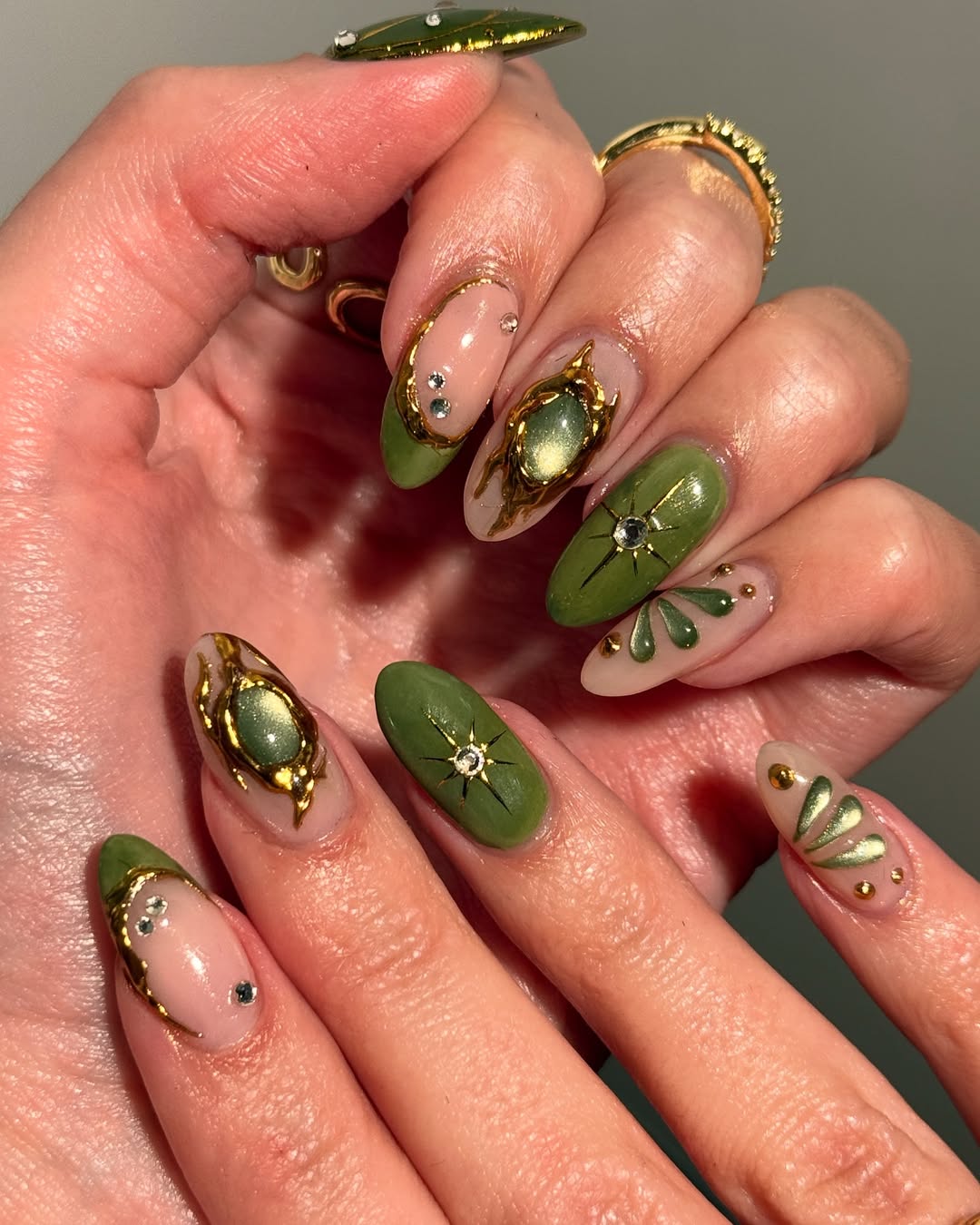 Emerald Green Aura Oval Nails with Gold Accents