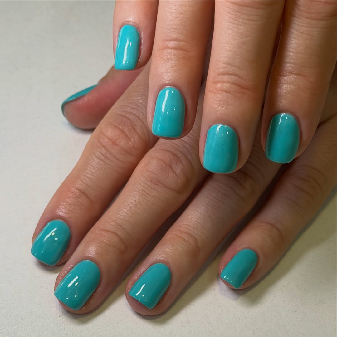 Glossy Bright Teal Squoval Nails