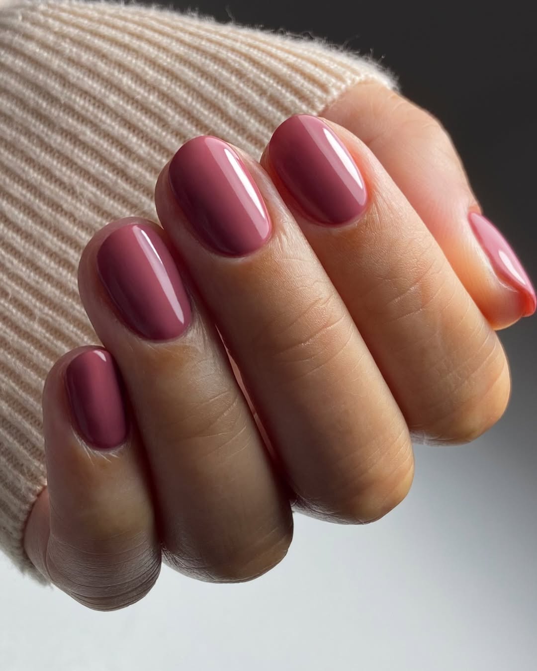 Glossy Mauve Oval Short Nails On Neutral Skin