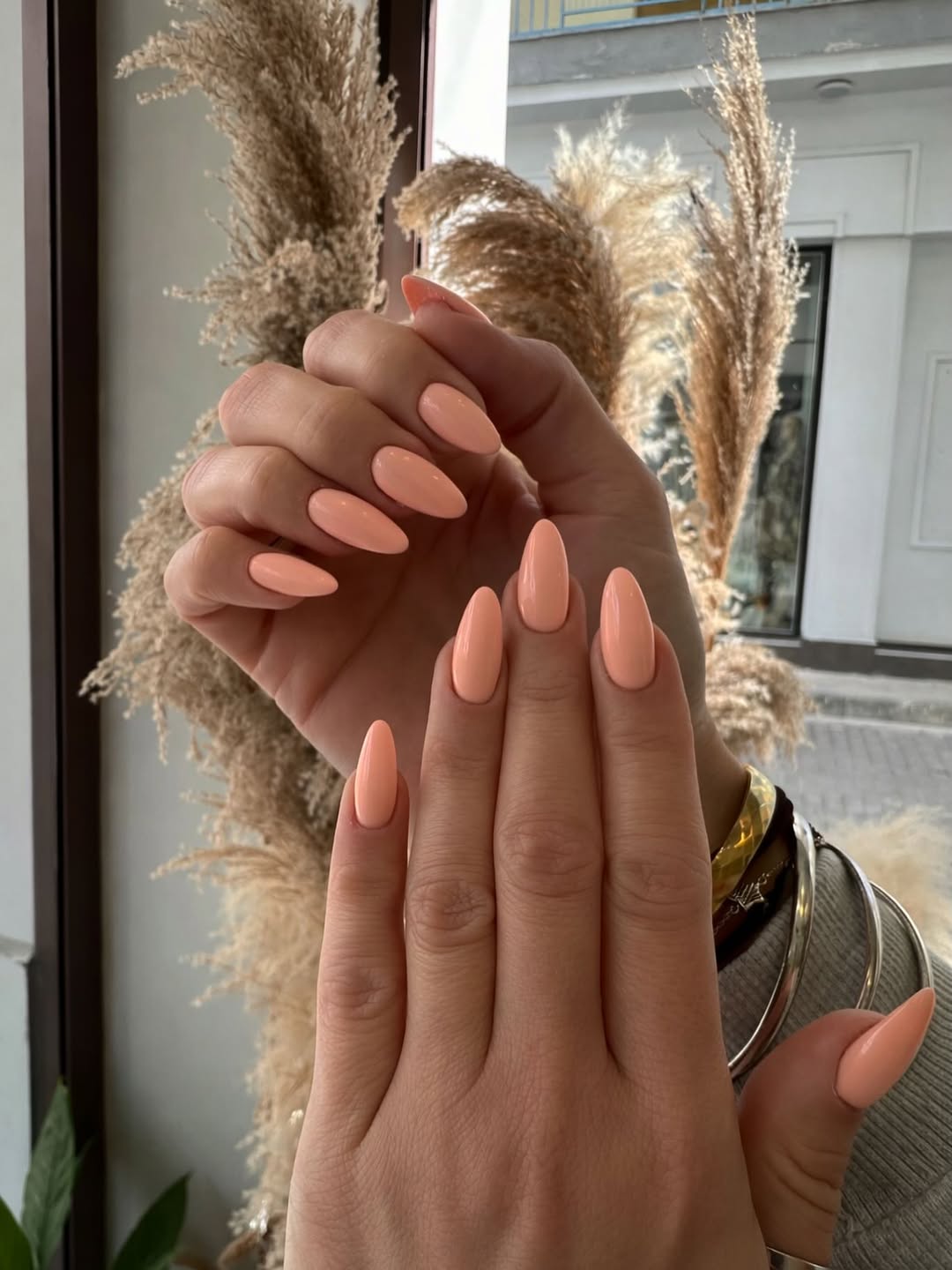 Glossy Peach Almond Shaped Solid Nails