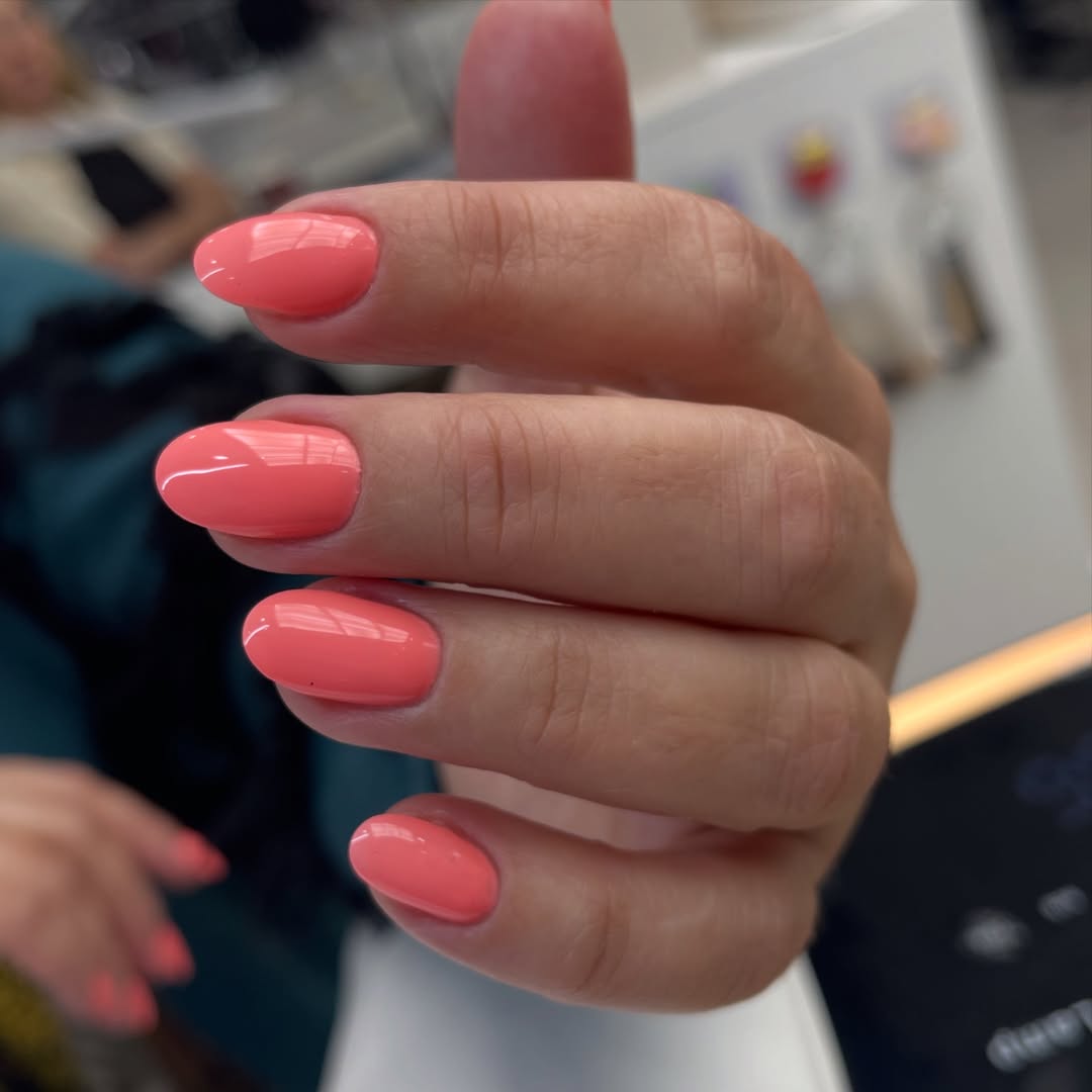 Glossy Peach Coral Short Oval Nails