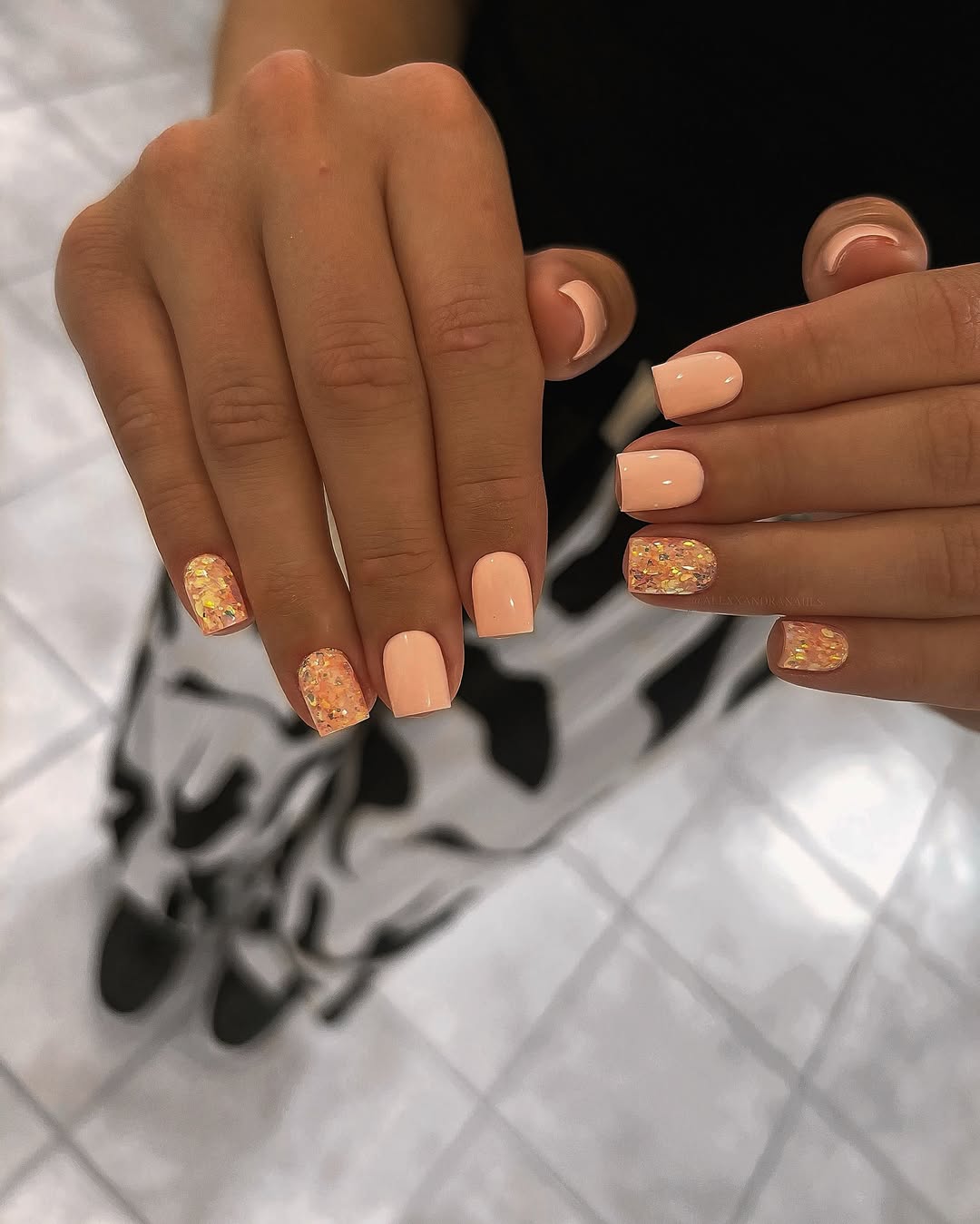 Glossy Peach Solid and Glitter Accent Nails