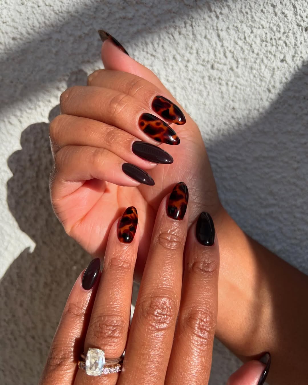Glossy Tortoise Shell Almond Nails
