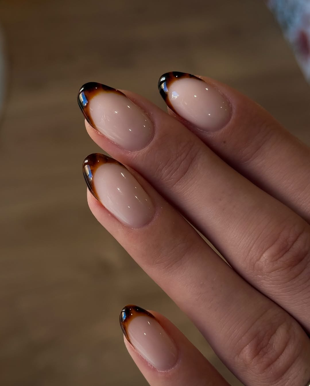 Glossy Tortoise Shell French Tip Almond Nails