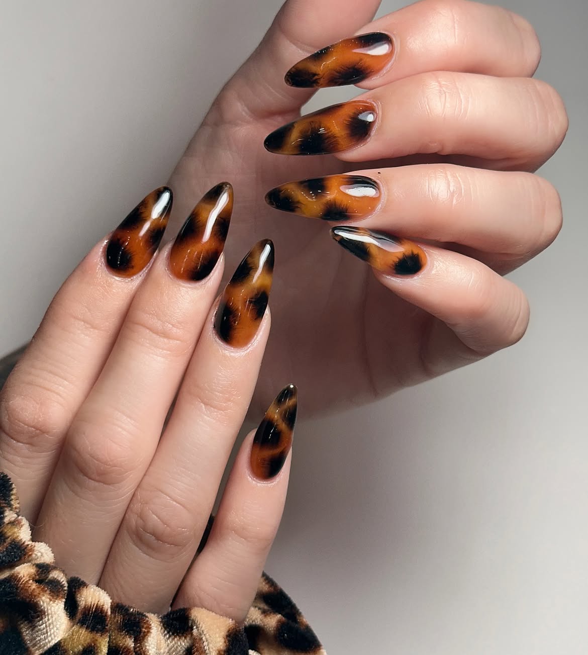 Glossy Tortoiseshell Almond Nails