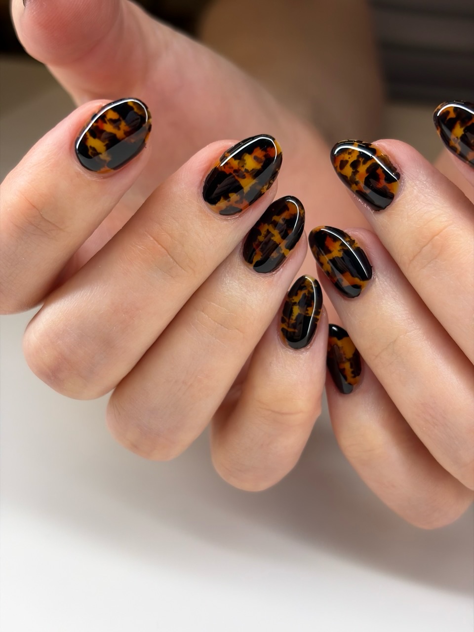 Glossy Tortoiseshell Pattern Almond Nails
