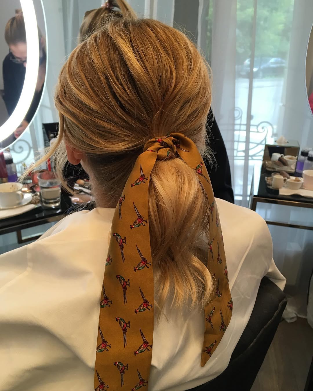 Golden Blonde Low Ponytail With Scarf Accent