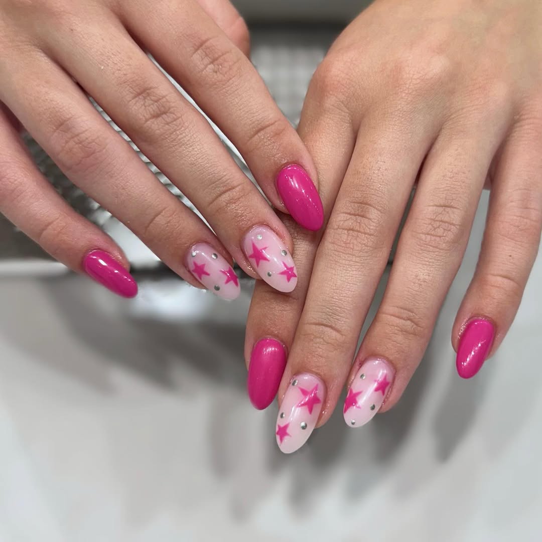 Hot Pink Starburst Oval Nails with Glitter Accents