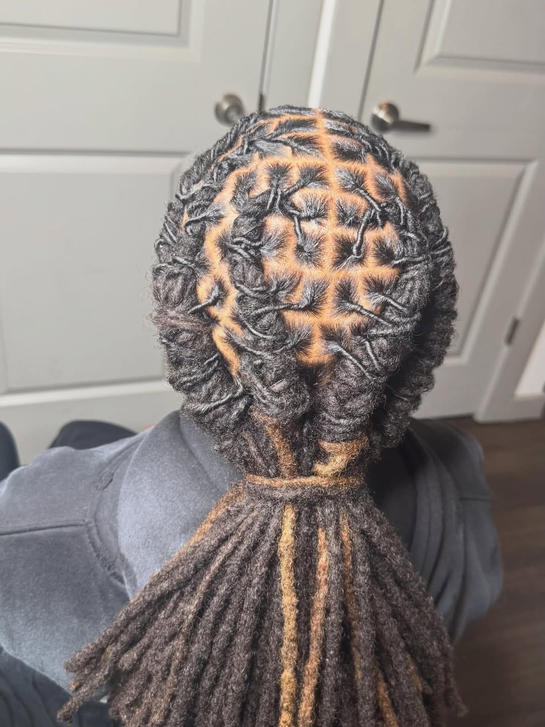 Intricate Box-Part Locs With Blonde Highlights