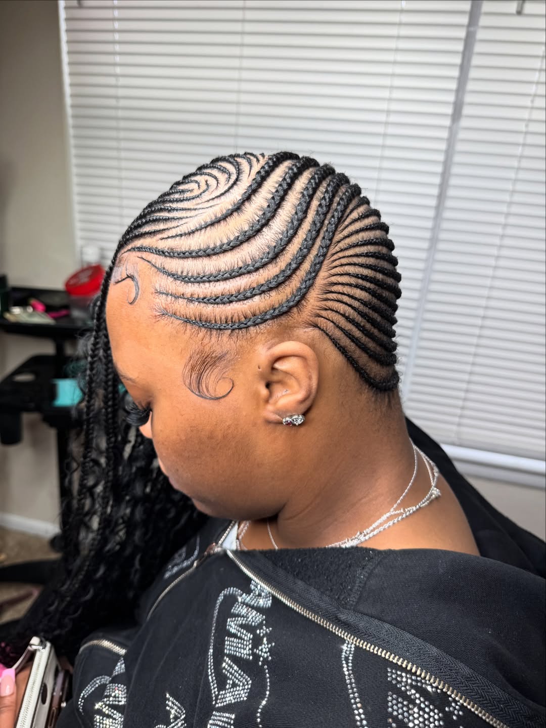 Intricate Cornrow Braids With Flowing Loose Ends