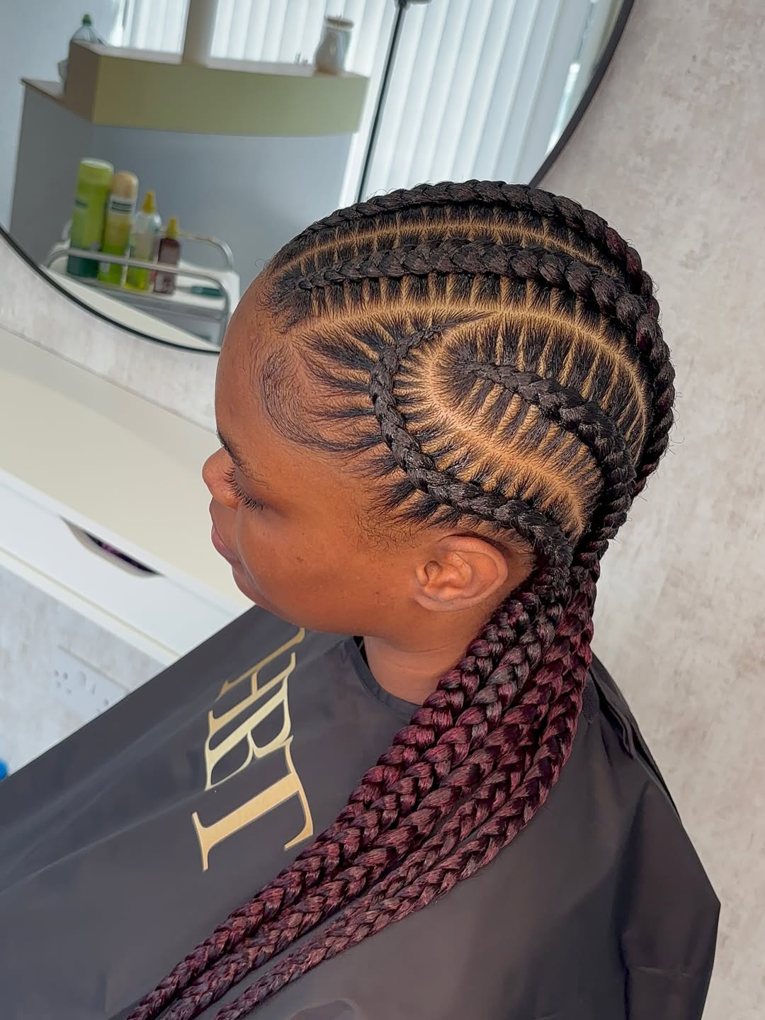 Intricate Cornrows With Burgundy Box Braids