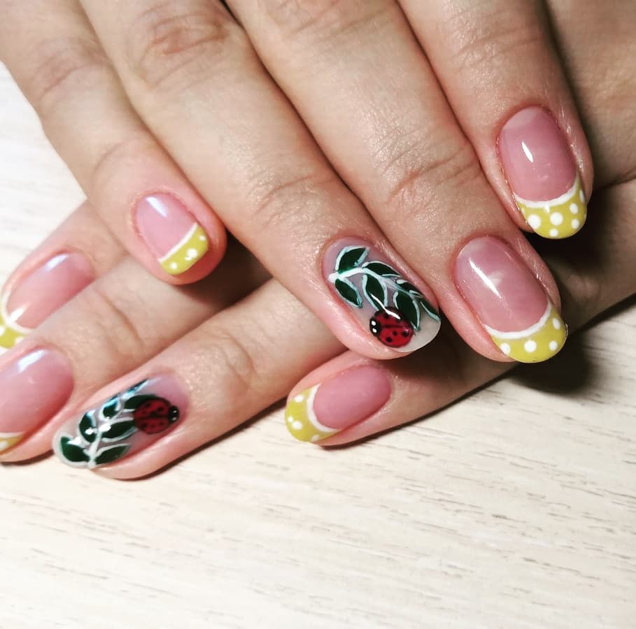 Ladybug French Tip Nails with Yellow Polka Dot Accents