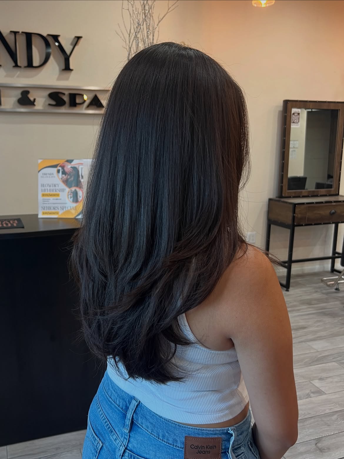 Layered Brunette Mid Length Cut With Subtle Face Framing