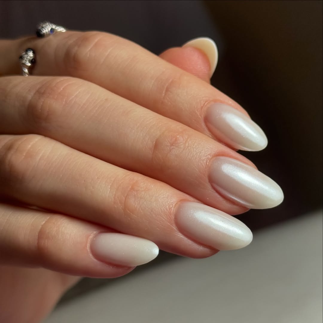 Luminous Pearly White Almond Chrome Nails