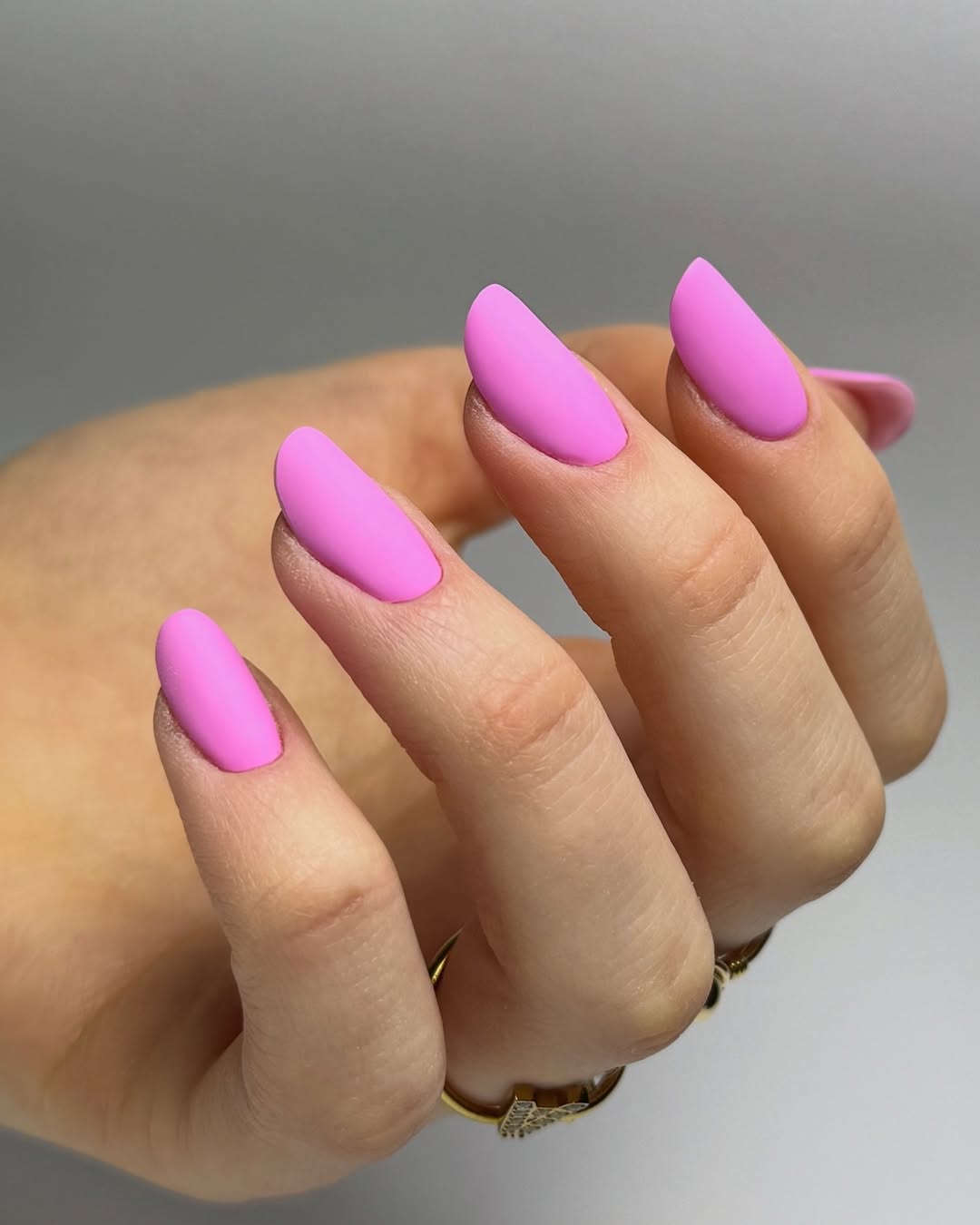 Matte Neon Pink Long Almond Nails