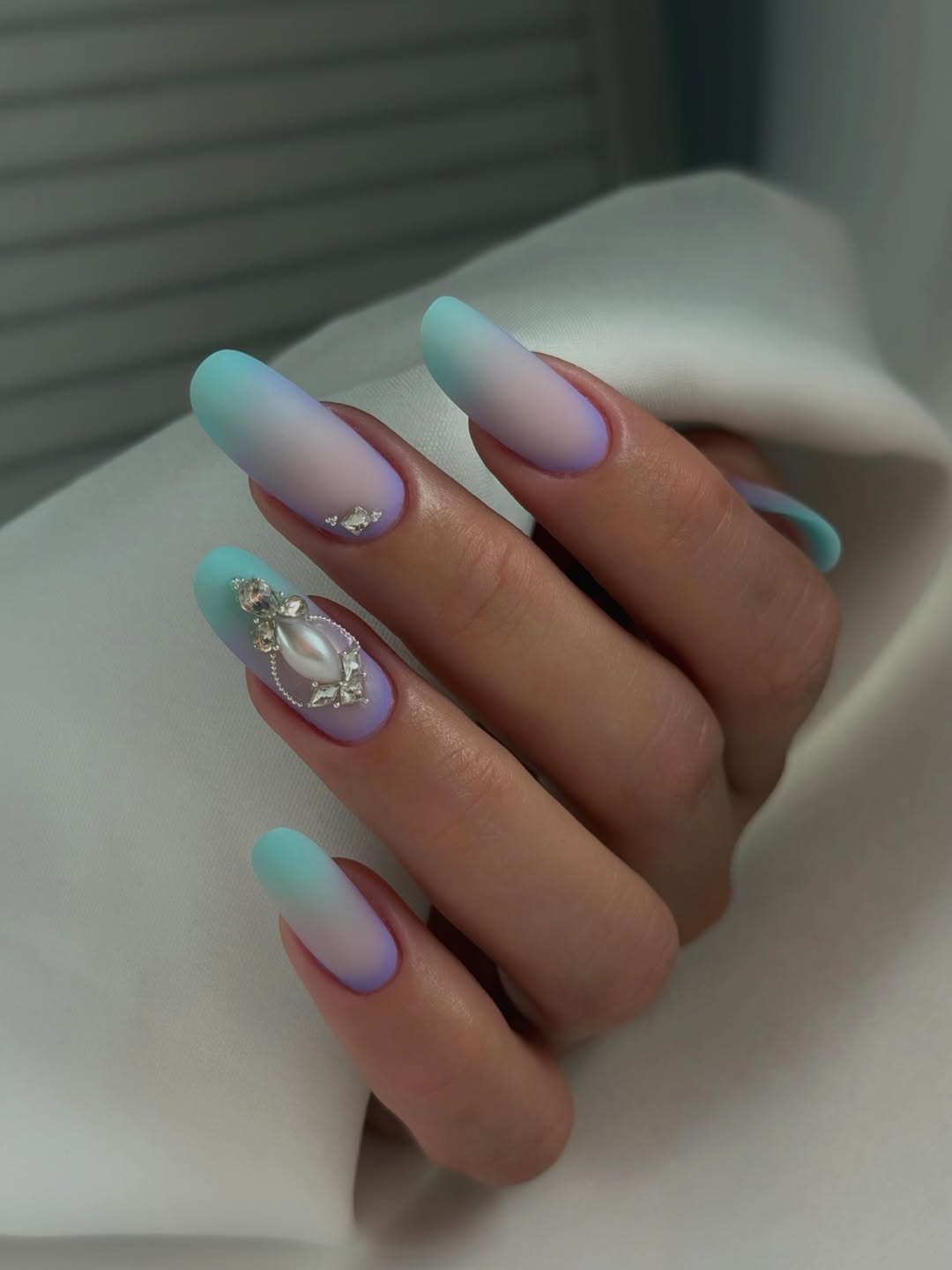 Matte Pastel Ombre Oval Nails with Rhinestone Gems