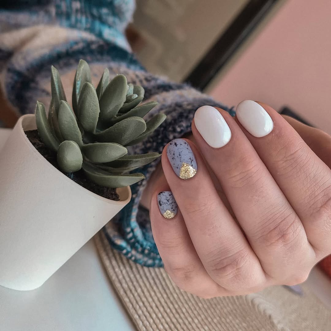 Matte Speckled Blue Oval Nails with Gold.