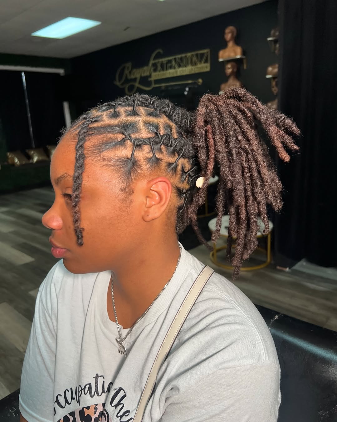 Mid-Back Locs Styled in Geometric Pattern Ponytail