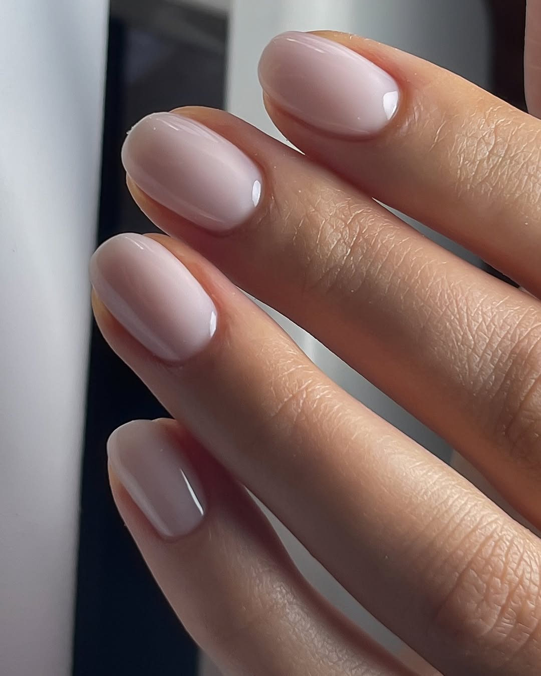 Milky Pink Oval Nails With High Gloss Finish