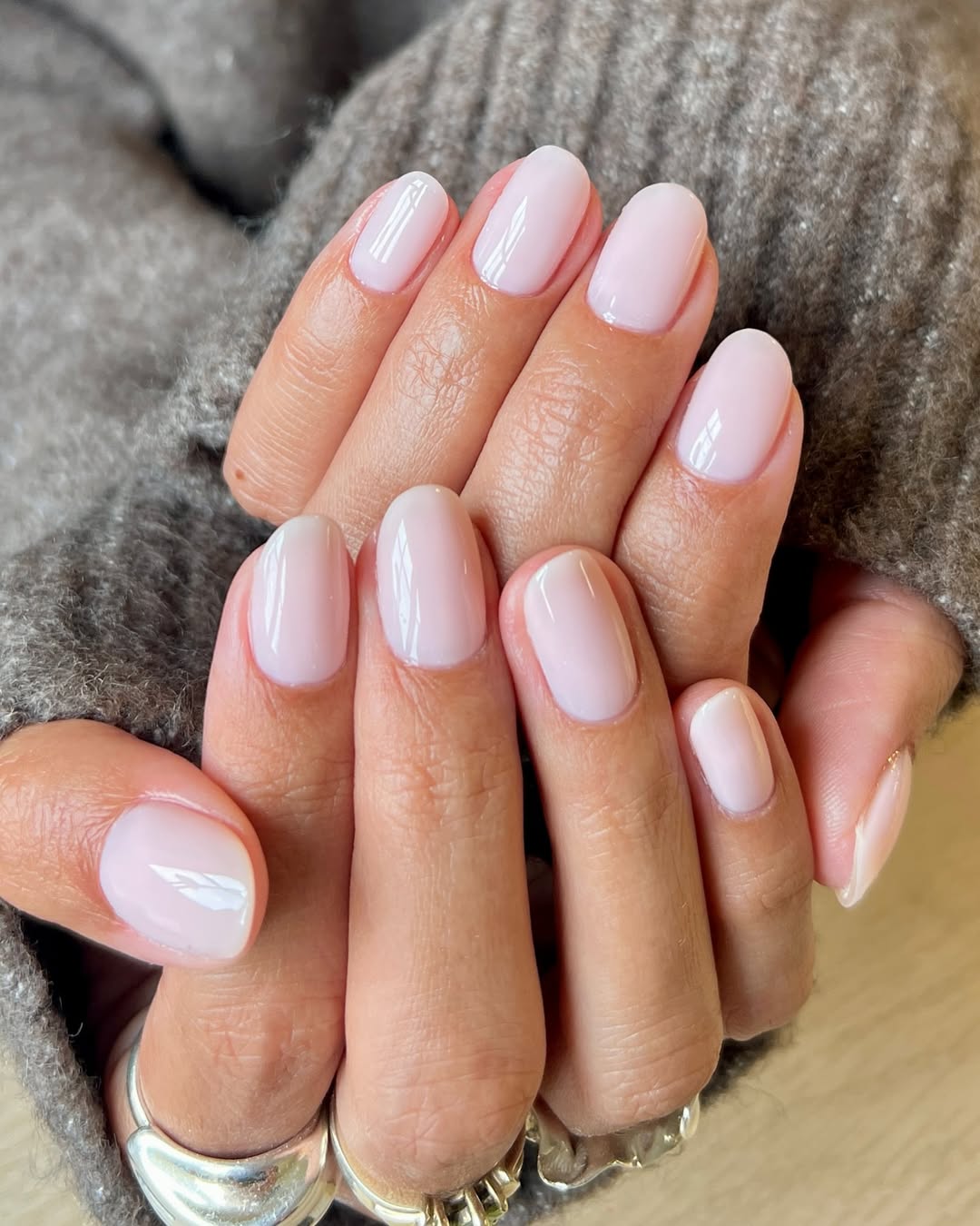 Milky Pink Oval Nails With High Gloss Finish