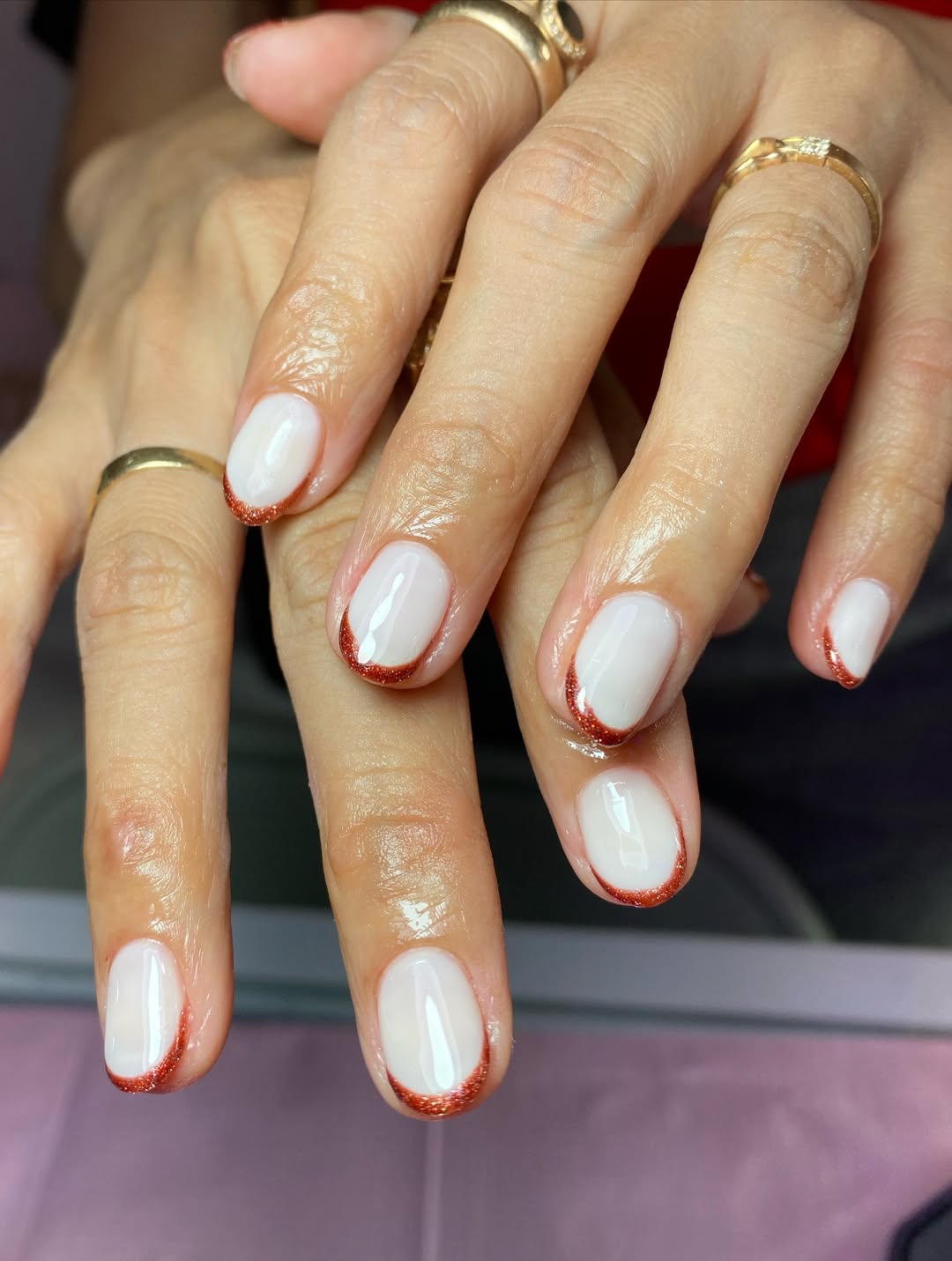 Milky White Oval Nails With Glitter French Tips