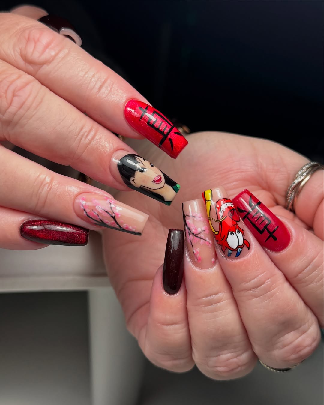 Mulan Inspired Hand-Painted Character and Cherry Blossom Nails