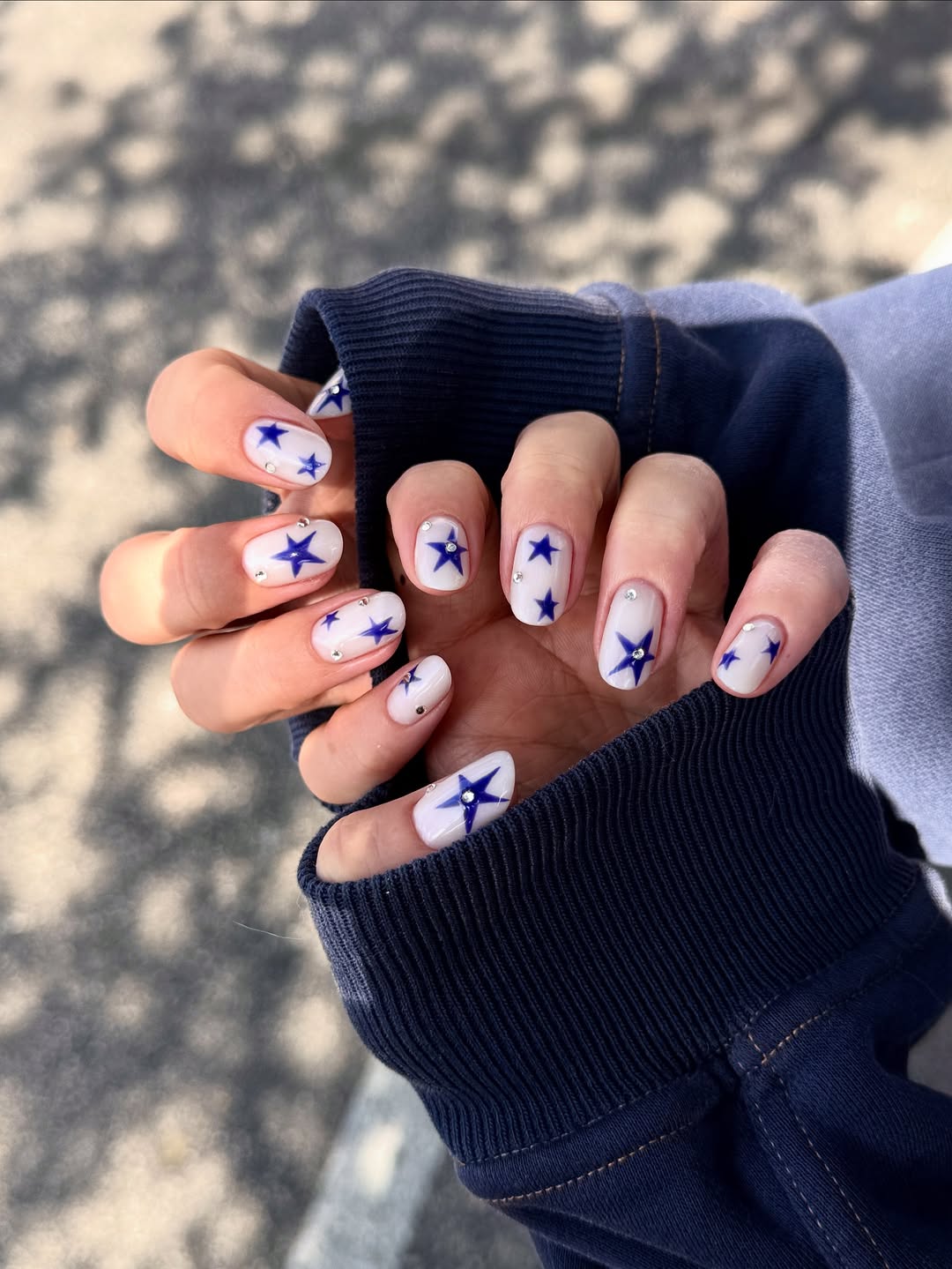 Navy Starburst Rhinestone Almond Nails